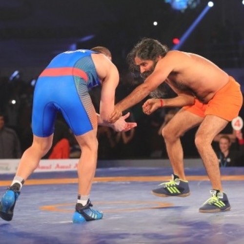 Baba Ramdev beats Olympic medalist in promotional PWL bout