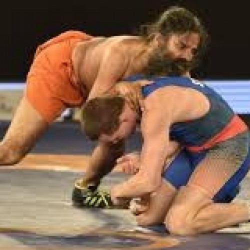 Watch Baba Ramdev wrestle and beat an Olympic silver medalist